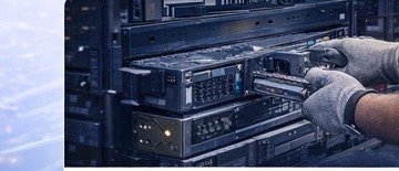 Technicians decommissioning and removing IT equipment